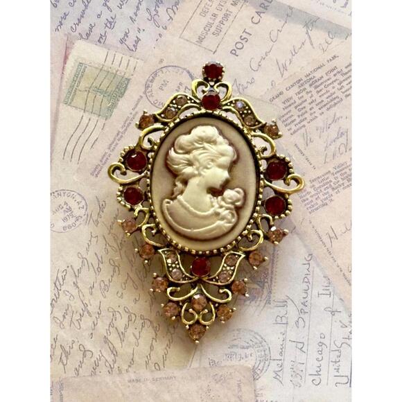 Cameo Jewelry - Classic Cameo Lady Brooch Ornate Gold Tone Red Rhinestone Frame